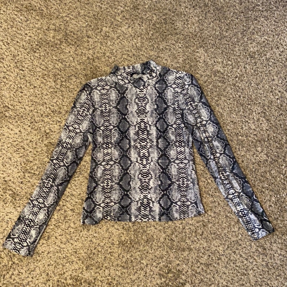 Mock neck, tight fitting long sleeve, snake skin pattern